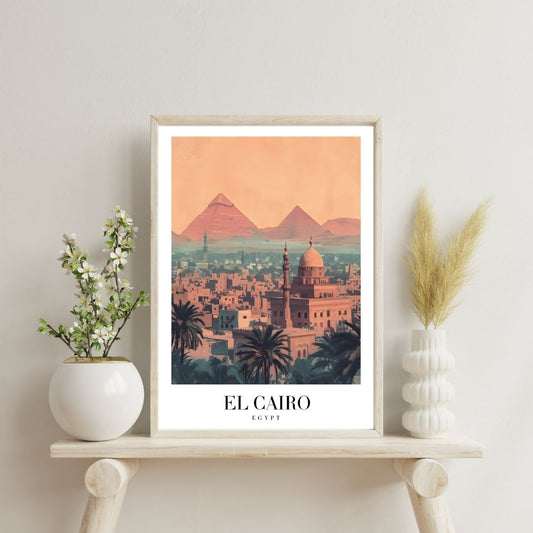 Framed artwork of a cityscape with mountains and text 'EL CAIRO' on a shelf with decorative plants.
