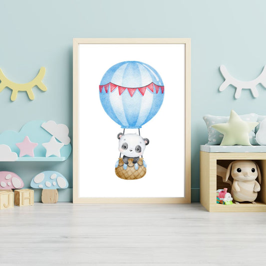 Framed artwork of a panda in a hot air balloon in a child's room.