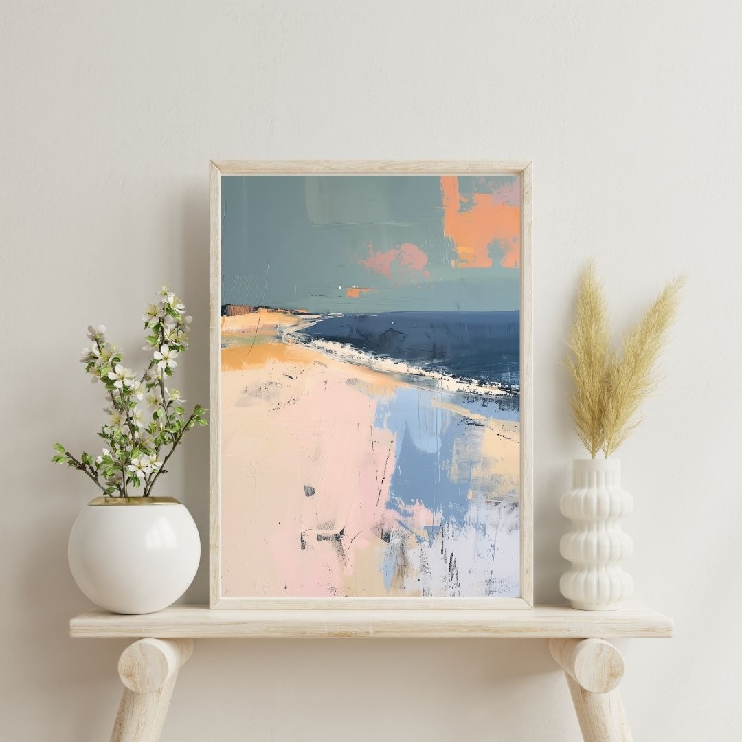 Framed abstract art piece on a shelf with decorative plants against a light wall.