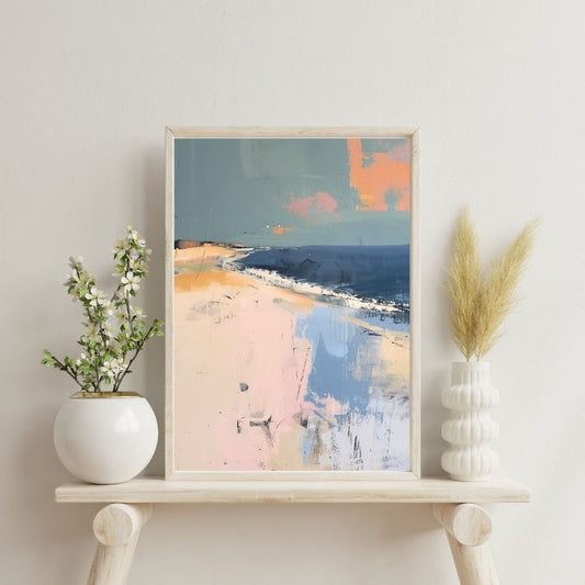 Framed abstract art piece on a shelf with decorative plants against a light wall.