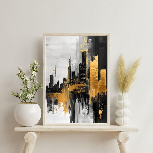 Framed abstract cityscape art piece on a shelf with decorative plants.