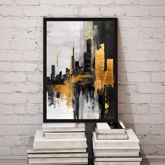 Framed abstract art with black and gold colors on a white brick wall.