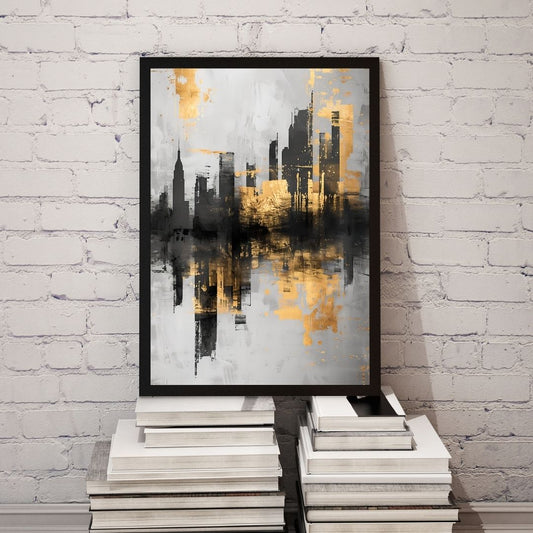 Framed abstract cityscape art piece on a white brick wall.