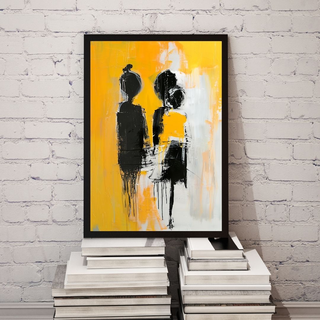 Abstract art print with black and white figures on a yellow background, framed and leaning against a white brick wall.