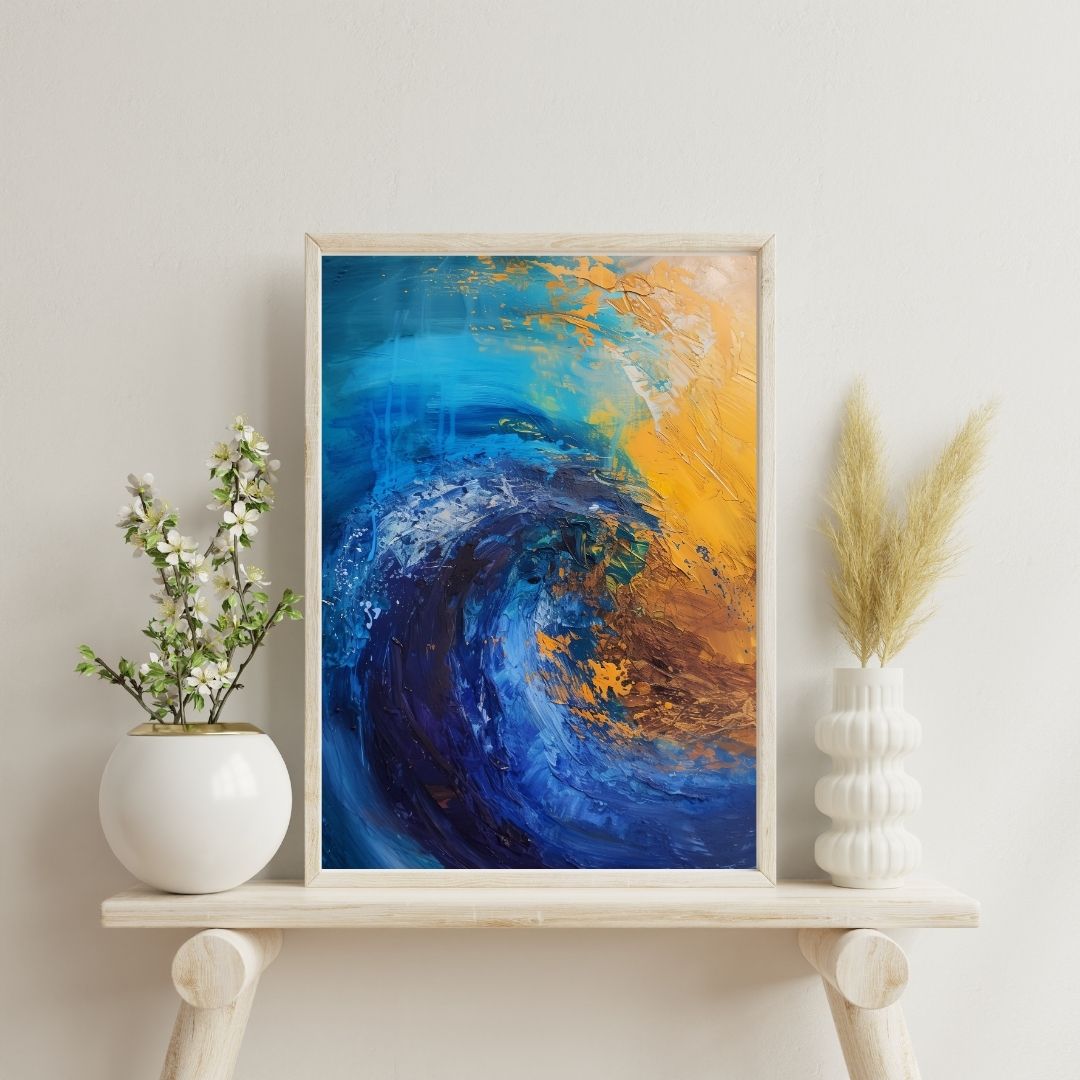 Framed abstract artwork with blue and orange swirls on a white shelf with decorative plants.