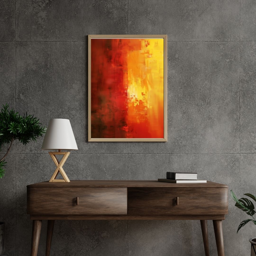 Abstract painting on a gray wall above a wooden console table with a lamp and books.