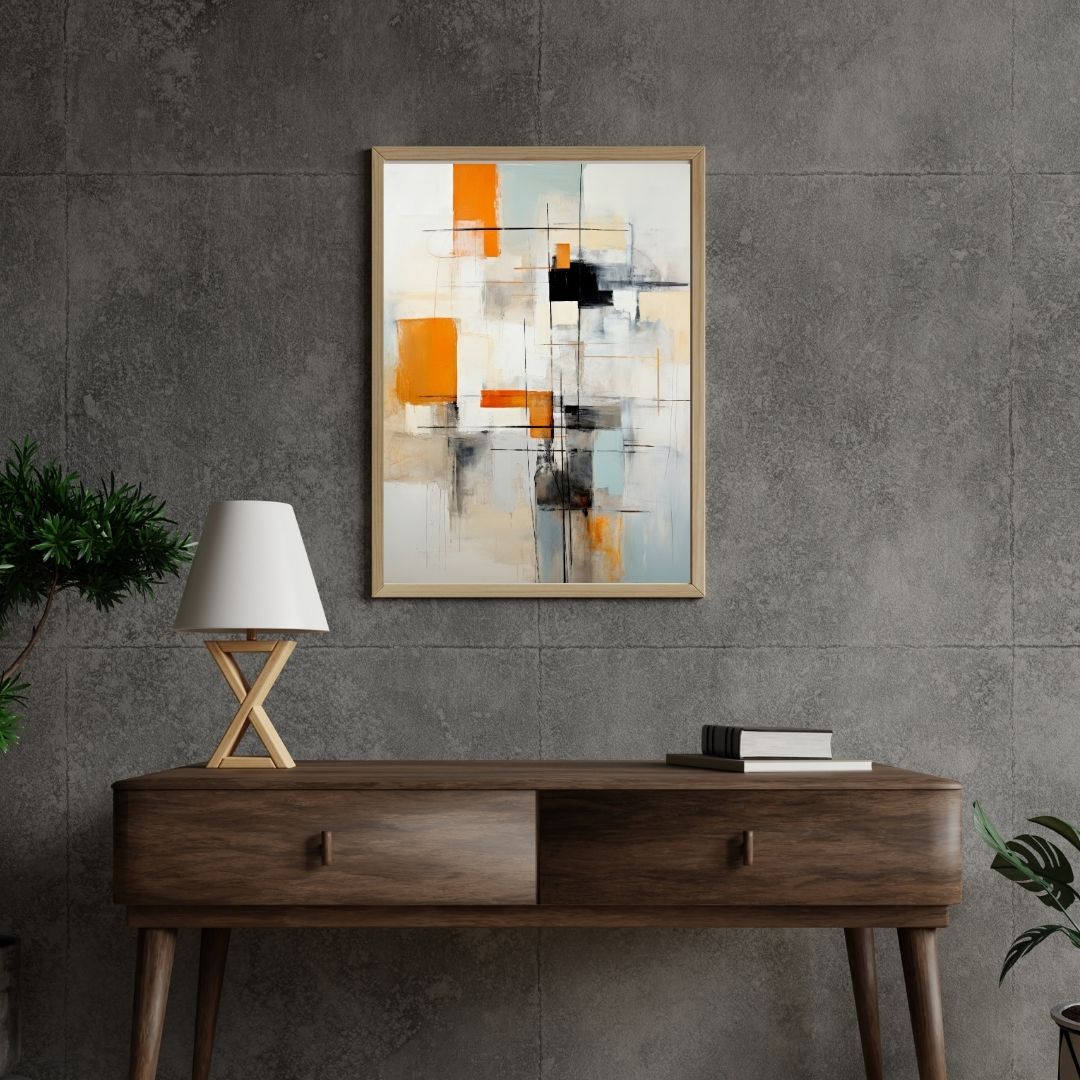 Abstract painting on a gray wall above a wooden console table with a lamp and books.