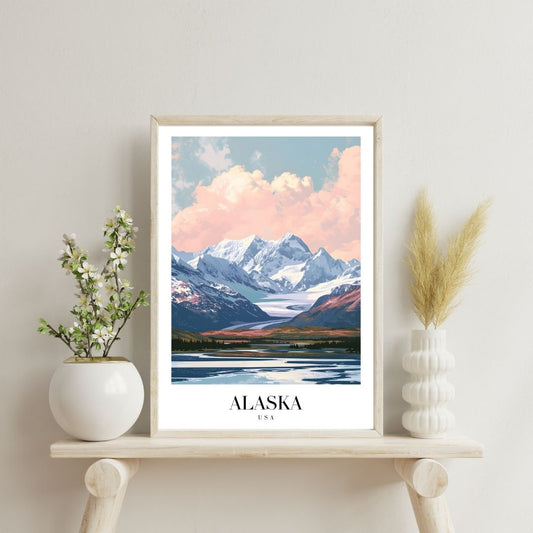 Framed artwork of a mountain landscape with 'Alaska' text on a shelf with decorative items.