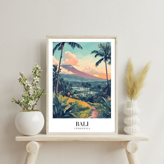 Framed artwork of a tropical landscape with palm trees and mountains, labeled 'Bali Indonesia', on a shelf with decorative plants.