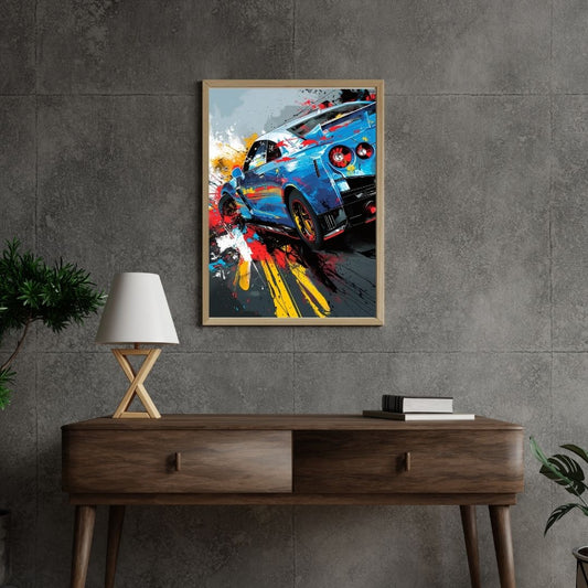 Framed artwork of a blue car on a gray wall above a wooden console table.