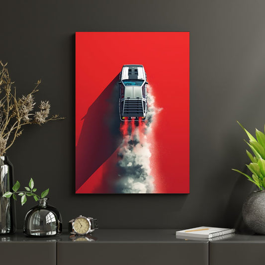 Framed artwork of a futuristic spaceship on a red background, displayed on a dark surface with decorative items.