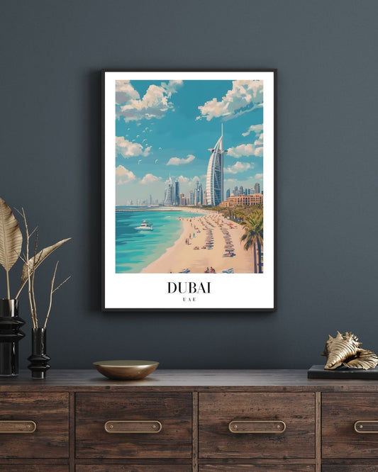 Framed poster of Dubai beach and skyline on a dark wall above a wooden cabinet.