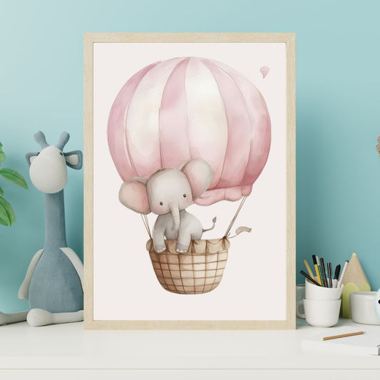 Framed artwork of an elephant in a pink hot air balloon on a light blue wall.