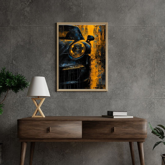 Framed artwork of a car on a gray wall above a wooden console table.