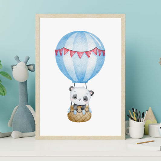 Framed artwork of a panda in a hot air balloon on a light blue wall.