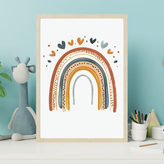 Framed artwork with a colorful rainbow design on a white background, placed on a shelf against a light blue wall.