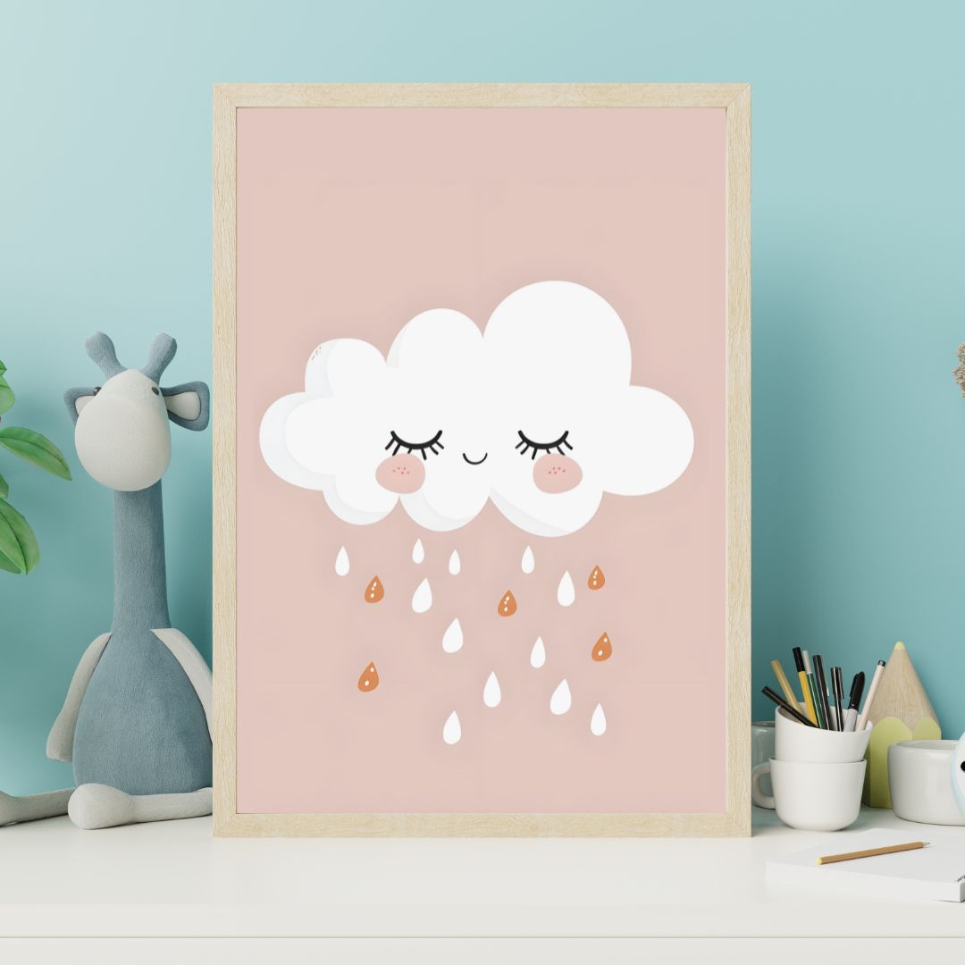 Framed artwork of a cloud with a smile on a pink background, placed on a shelf with stationery items.