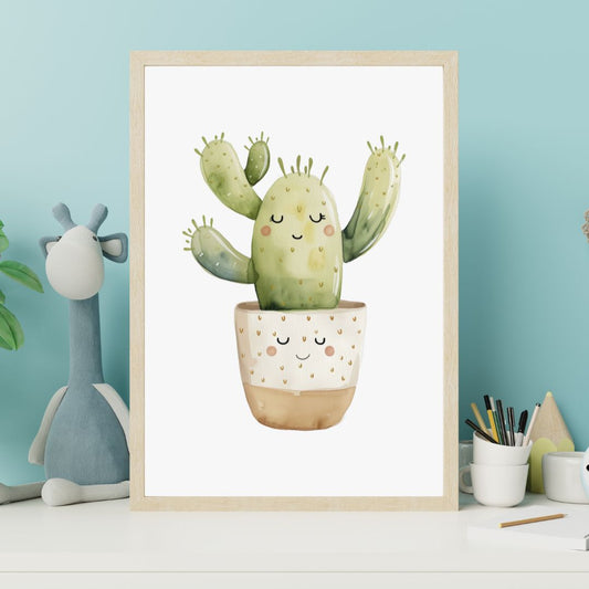 Framed artwork of a cartoon cactus with a smiling face on a shelf against a light blue wall.