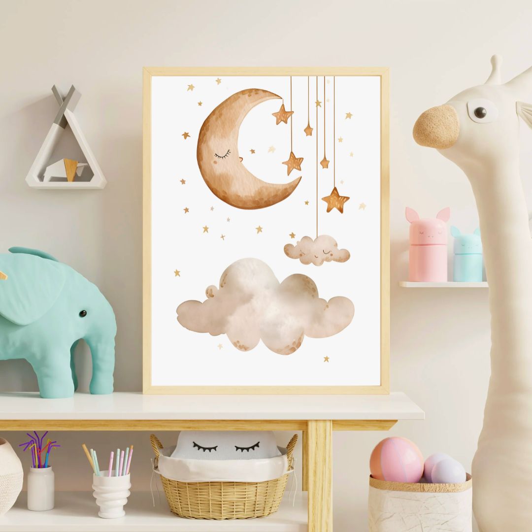 Framed artwork with a moon and cloud design in a child's room.
