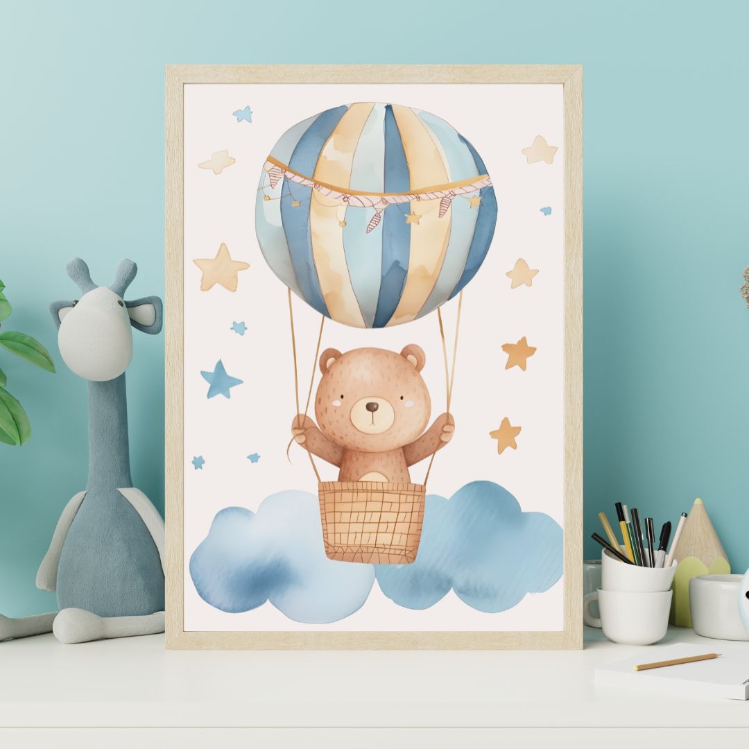 Framed children's poster of a bear in a hot air balloon with stars and clouds, on a light blue wall.