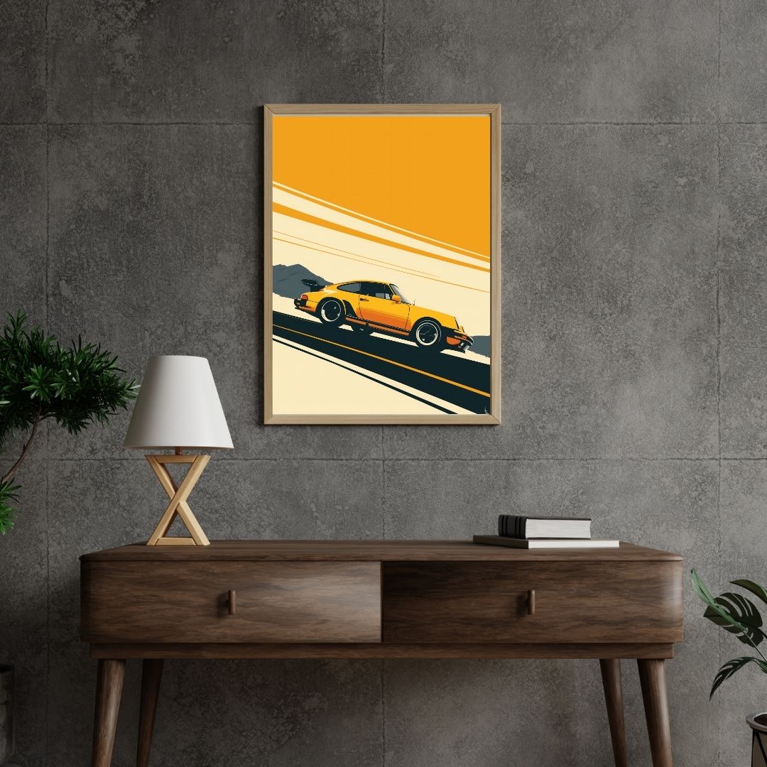 Framed artwork of a yellow car on a gray wall above a wooden console table.