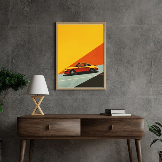 Framed artwork of a red sports car on a yellow and orange background above a wooden console table.